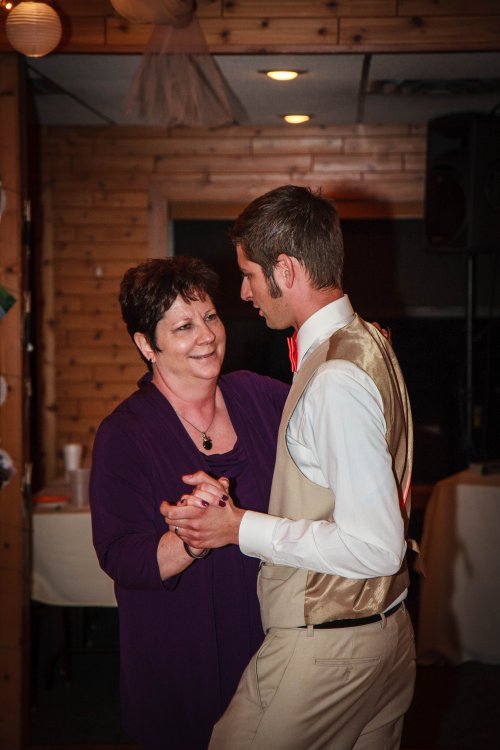 Mother and groom dance